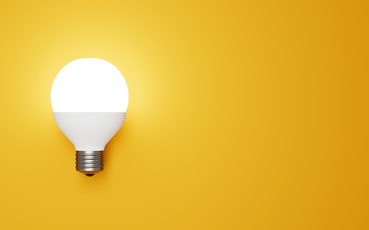 3d illustration of LED light bulb on yellow background for graphic resource use