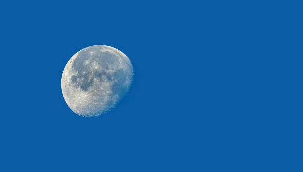 istock the moon on a blue background 1442799181