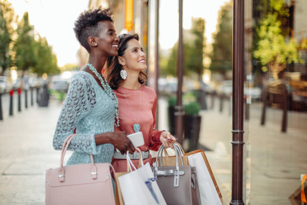 istock Friends are window shopping 1442799653