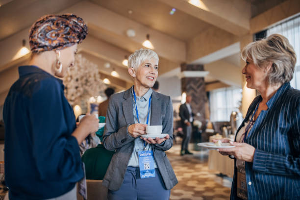 istock Businesswomen at convention 1442799838