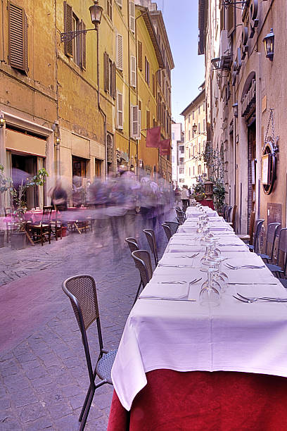 istock Street scene from Rome, depicting a restaurant 144280170