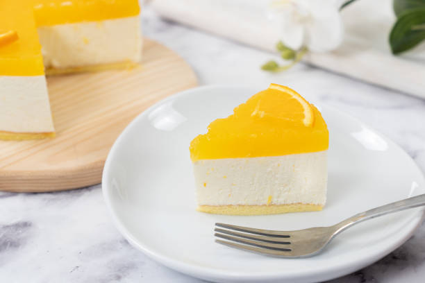istock No baked orange cheese cake with fresh oranges decoration 1442804043