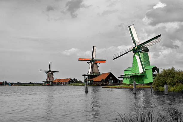 Three Dutch windmills stock photo