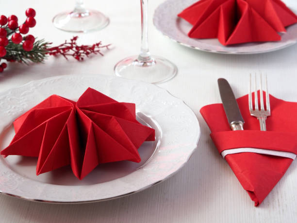 istock Christmas table setting in red and white. Close up 1442806753