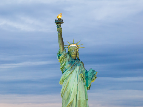 Close up photo of Statue of Liberty at dawn - New York City