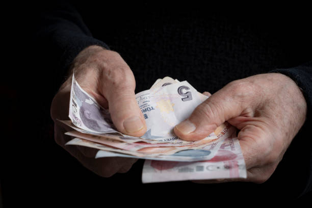 istock Man Giving Turkish Currency 1442810337