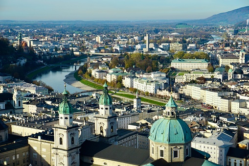 View of Salzburg from above in autumn. Autumn Salzburg from a bird's-eye view. Top view of autumn Salzburg. Beautiful view of autumn Salzburg.  The Austrian town of Salzburg in autumn.