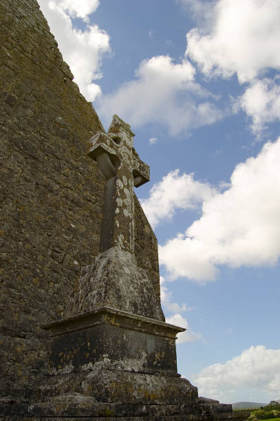 istock Celtic cross in Kilmacduagh monastery. Ireland 144281739