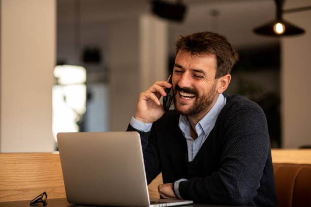 istock Handsome young man on a phone call in a restaurant 1442817649