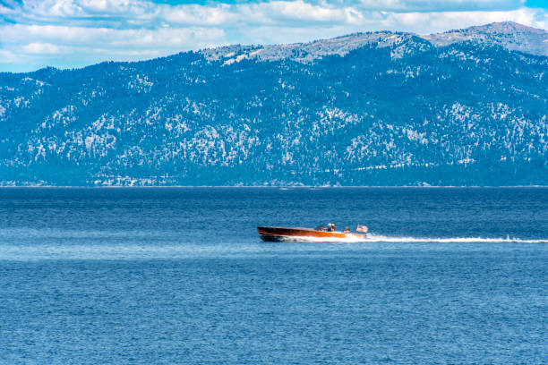 Classic Speedboat on Lake Tahoe A vintage Chris Craft wooden speed boat is cruising on Lake Tahoe. Mountains in Nevada are the backdrop.
Meeks Bay, California, USA
06/27/2022 robert michaud stock pictures, royalty-free photos & images