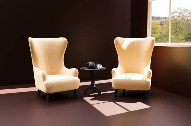 istock Living room with two armchairs and a small table with tea. 1442822363
