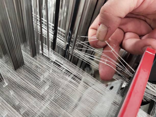 istock People working in the textile loom 1442823830