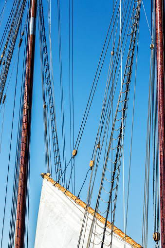 Large sailboat moored in port