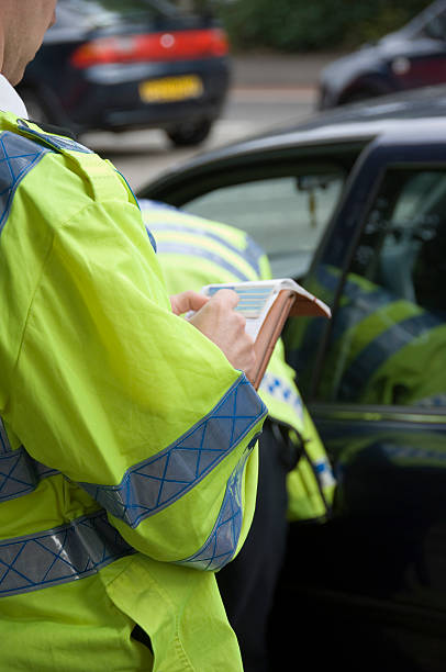 istock Police officer recording details 144282546