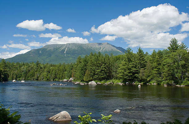 Katahdin and River Mt. Katahdin in Maine towers over the flowing Penobscot River. mt katahdin stock pictures, royalty-free photos & images