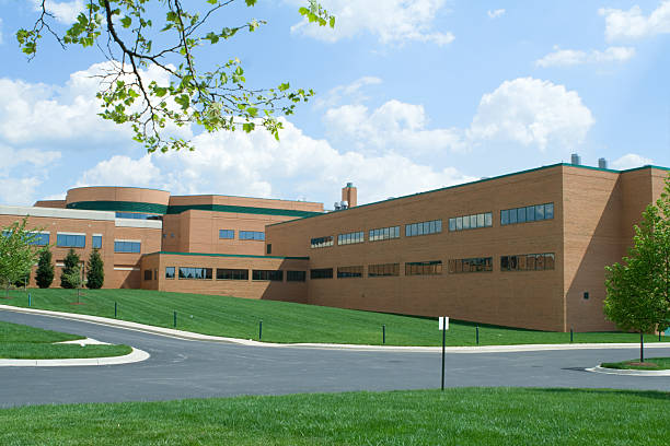 istock New Red Brick Office Building Grass Intersection Road Suburban Maryland 144282859
