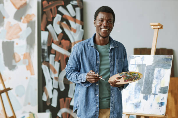 istock Young successful and talented artist with color palette 1442832569