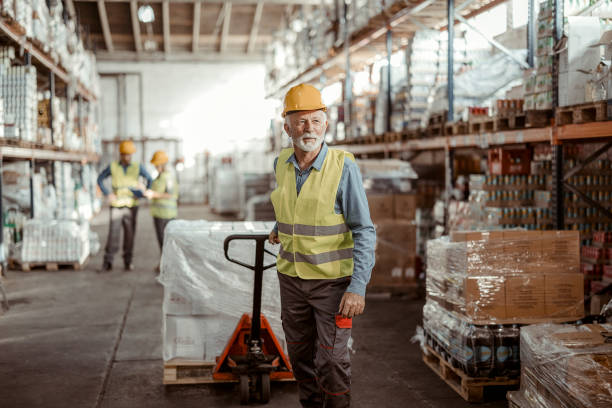 istock Senior Worker using Hand Pallet Truck 1442832756