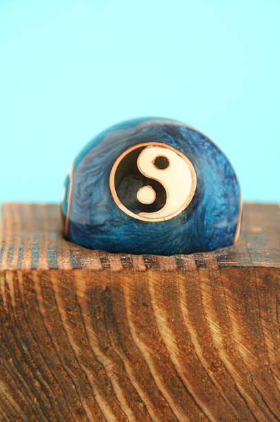 istock yin and yang ball on wood 144283467