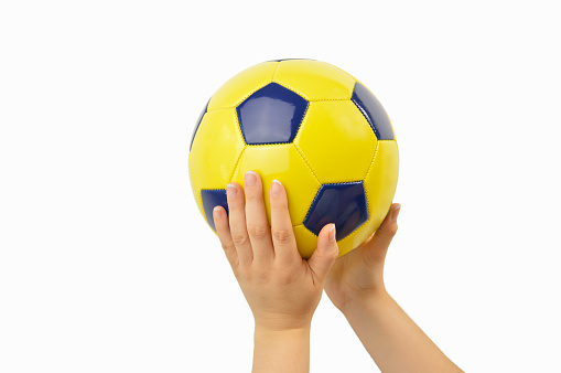 football fan holding a soccer ball with white background