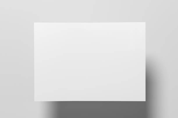 istock A sheet of paper mock up floating above the white table. 1442836660