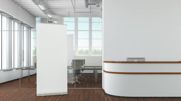 istock Blank roll up banner stand mock up in modern office. 1442836780
