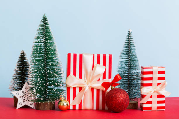 istock Christmas composition. craft Gift box, small tree, branches and craft DIY decorations on white background. New year concept. Christmas home decoration Flat lay, top view, copy space 1442837433