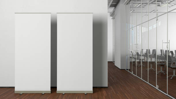 istock Blank roll up banner stands mock up in modern office. 1442837683
