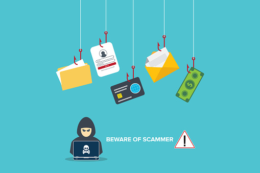 Beware of scammer. Hacker with laptop computer stealing confidential data, personal information and credit card detail. Hacking concept.