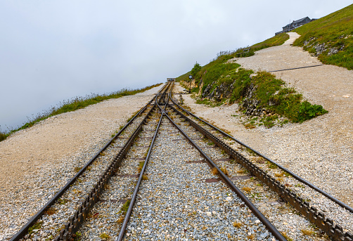 Sankt Wolfgang, Austria, July 10, 2022: View of the dead end in the railway station of the Schafbergbahn train in the Austrian Alpes at an eltitude of 1,783 meters on a cloudy summer day.
