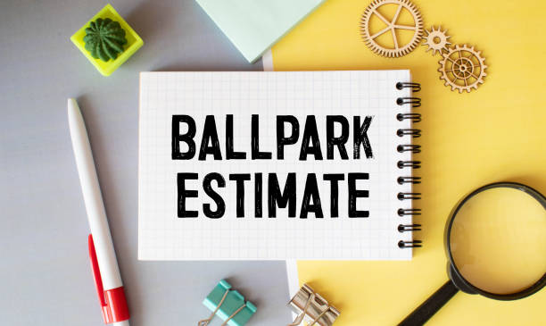 istock Business concept. open notepad with text on calendar - BALLPARK ESTIMATE 1442844874
