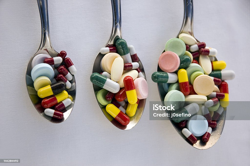 spoon pills Affectionate Stock Photo