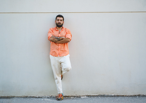 Fashionable young man posing on the street