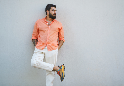 Fashionable young man posing on the street