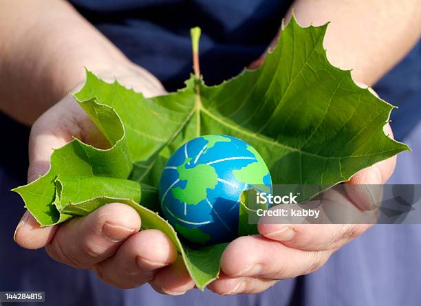 Environmental Conservation Stock Photo - Download Image Now - Blue, Care, Cheerful