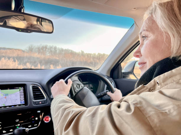 istock Woman driving car 1442848664