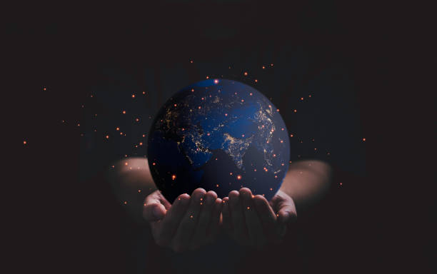 istock Man holding planet by two hands for earth day and saving energy environment concept ,Element of this image from NASA and 3d render. 1442849065