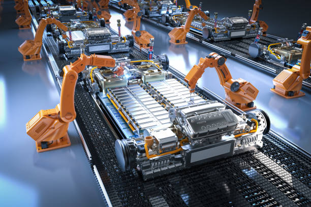 Robot assembly line with electric car battery cells module on platform Automation automobile factory concept with 3d rendering robot assembly line with electric car battery cells module on platform manufacturing stock pictures, royalty-free photos & images