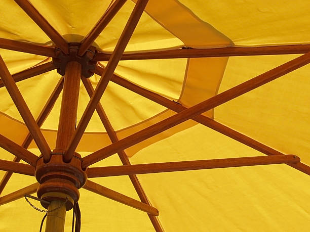 Yellow umbrella abstract stock photo