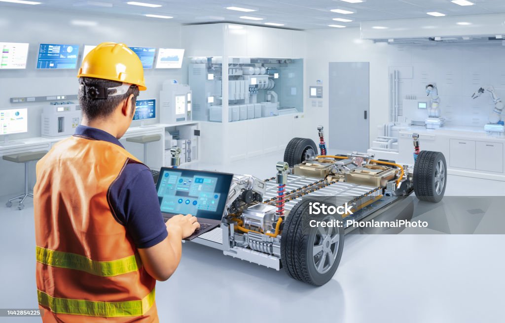 Asian engineer with ev car battery cells module in laboratory Asian engineer or technician work with ev car battery cells module in laboratory Battery Stock Photo