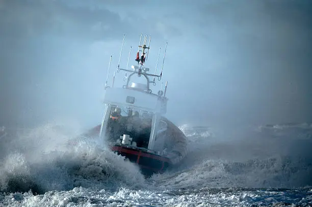 Photo of Coast Guard ship during storm in ocean