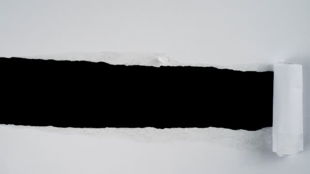 Horizontal torn paper stop motion for copy space. Ripped paper animation for video effect overlay