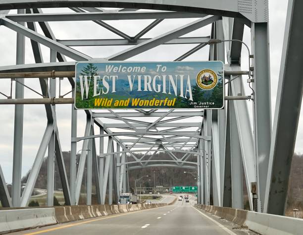 West Virginia State Welcome Sign The welcome sign entering the state of West Virginia in the United States. west virginia us state stock pictures, royalty-free photos & images