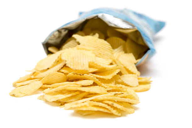 istock Bag of open potato chips pouring towards the viewers 144285847