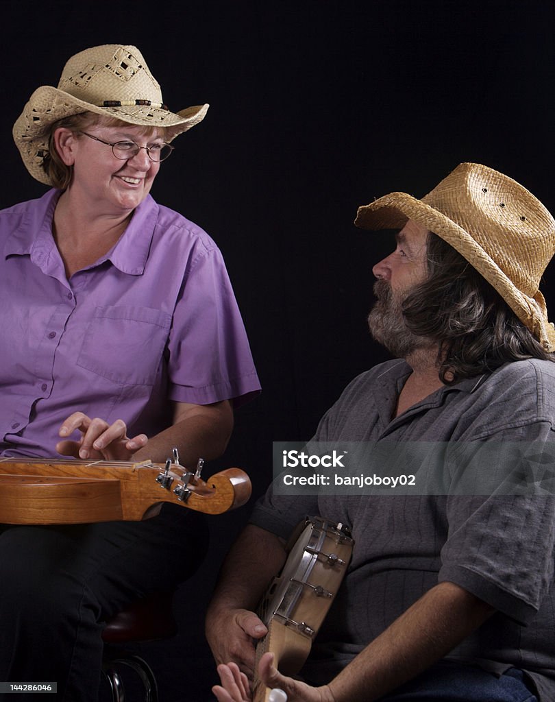 Musicians Two musicians enjoying playing together Adult Stock Photo