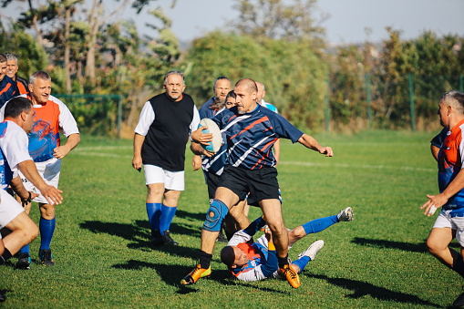 Veteran amateur rugby players during the match.