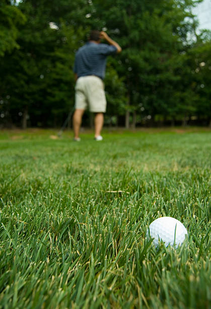 Golfer looking for his ball stock photo