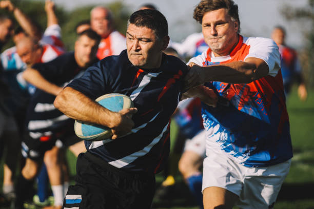 amateur rugby vets in action stock photo