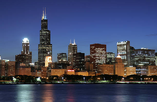istock Chicago skyline at night from water  144286672