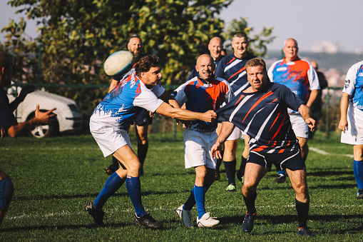 Veteran amateur rugby players during the match.
